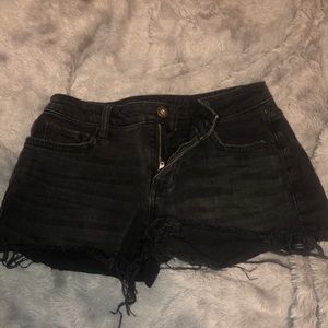 Black. Size 0 Arizona jean shorts.